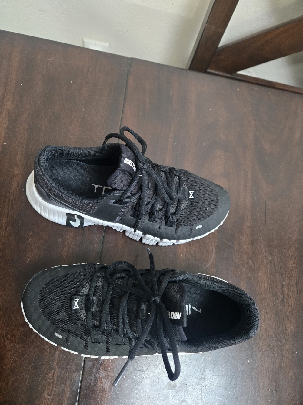 Nike Women’s Black Athletic Sneakers with White Sole Accents